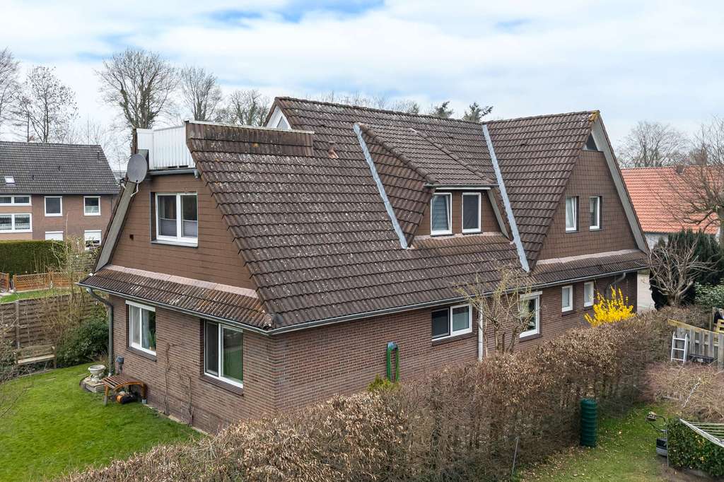 Immobilie in Apen - Vermietetes 3-Parteienhaus in zentraler Lage von Augustfehn, Obj. 9553 - Bild 4