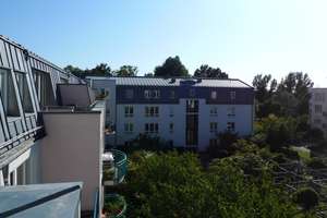 Penthouse-Feeling in Bogenhausen: sofort beziehbares 2-Zimmer-Schmuckstück mit Ausblick ins Grüne