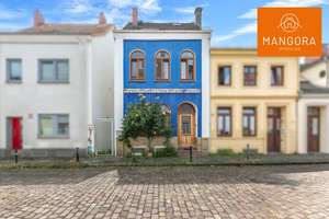 Ein blaues Haus im Viertel – voller Geschichte, Charme und Möglichkeiten