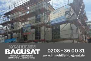 Neubau-Erstbezug: Erdgeschosswohnung mit Garten und Garage