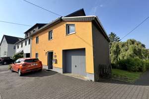 RESERVIERT - gepflegte Doppelhaushälfte mit Terrasse und Garage – Die vollständige Adresse der Immobilie erhältst du vom Anbieter., 56470 Bad Marienberg (Westerwald) – Vorschaubild 1