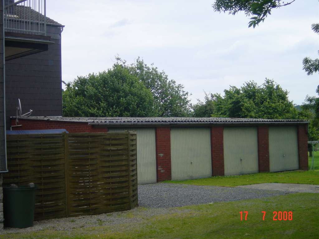 Immobilie in Stolberg - historisches MFH mit 3 Wohneinheiten, 4 Garagen, Stelllätzen und großem Gartenland - Bild 4