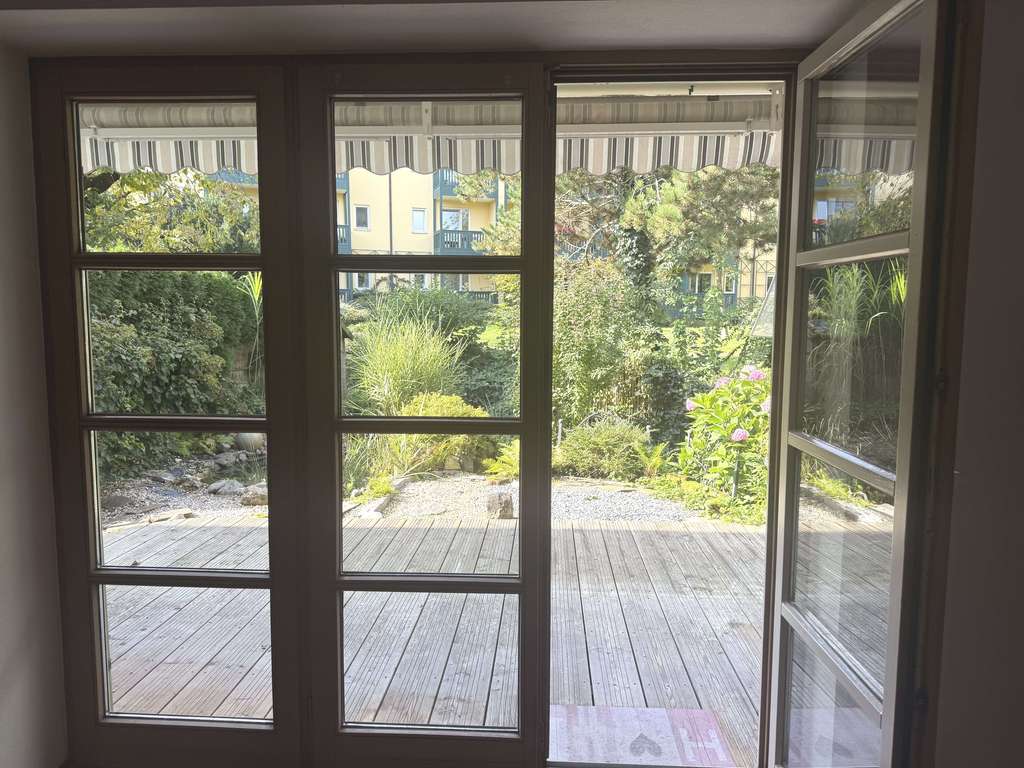 Immobilie in Prien am Chiemsee - Herrliche 2-Zimmer-Wohnung mit Terrasse und weiterem Potential im Souterrain - Bild 1