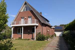 Erstbezug nach Sanierung: Traumhafte Maisonette-Wohnung mit idyllischem Garten am Naturschutzgebiet