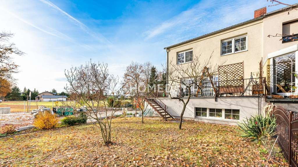 Immobilie in Paulinenaue - Kernsanierte Doppelhaushälfte mit 4 Zimmern, Keller, Tiefgarage, Nebengelass und Garten - Bild 2