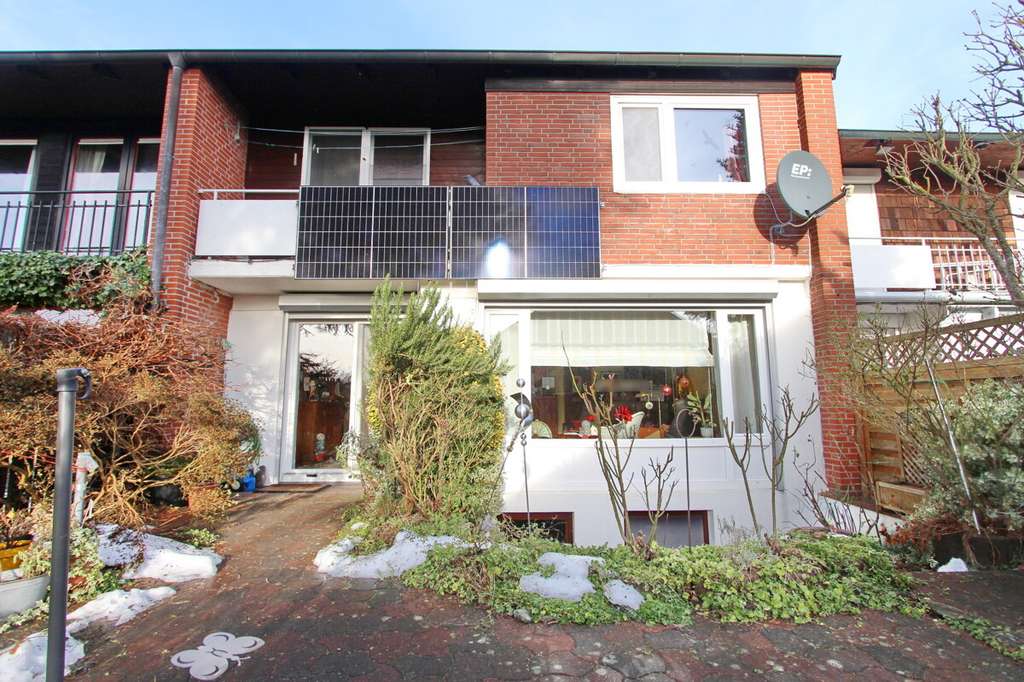 Immobilie in Bönningstedt - Geräumiges Mittelreihenhaus in familienfreundlicher Lage in Bönningstedt - Bild 1