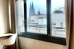Top 1-Zimmer-Apartment mit Domblick - möbliert