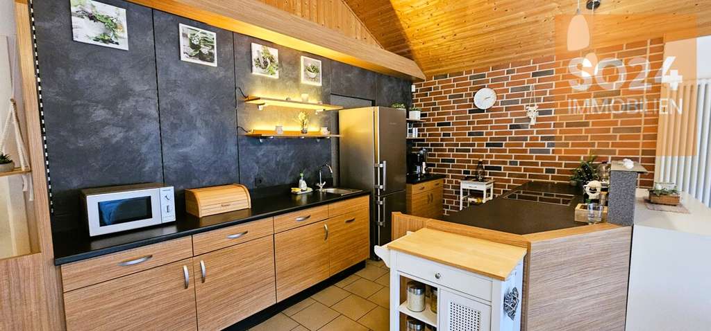 Immobilie in Inden - SO24 Inden Schophoven: Zwei Wohneinheiten,  Garagen, + Carport - Bild 2