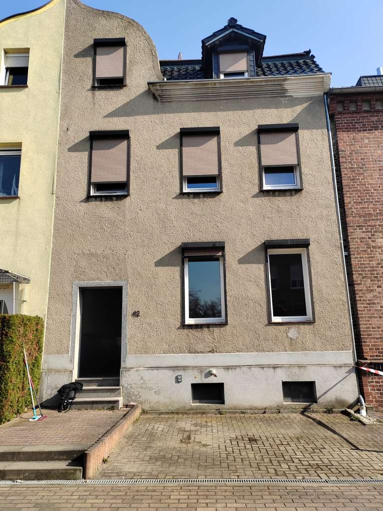 Immobilie in Raguhn-Jeßnitz - Reihenmittelhaus in Jeßnitz (Anhalt) mit Garten - Bild 0