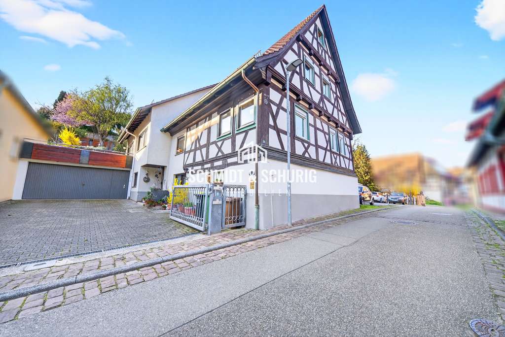 Immobilie in Königsbach-Stein - Zweifamilienhaus mit Garten und Vermietungspotenzial in ruhiger Lage - Bild 1