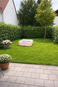Moderne 2-Zi Whg mit Küche, Terrasse, Garten & TG