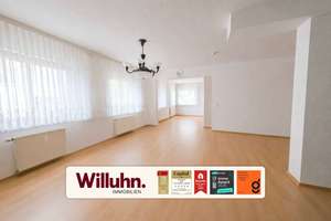 Komfortables Wohnen mit Hauscharakter | Großzügige EG-Wohnung mit Kamin, Gartenanteil & Garage