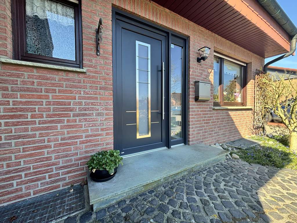 Immobilie in Horstmar - HAPPY HOME - HAPPY LIFE!
Gepflegte Doppelhaushälfte mit toll angelegtem Garten  
in Horstmar - Bild 1