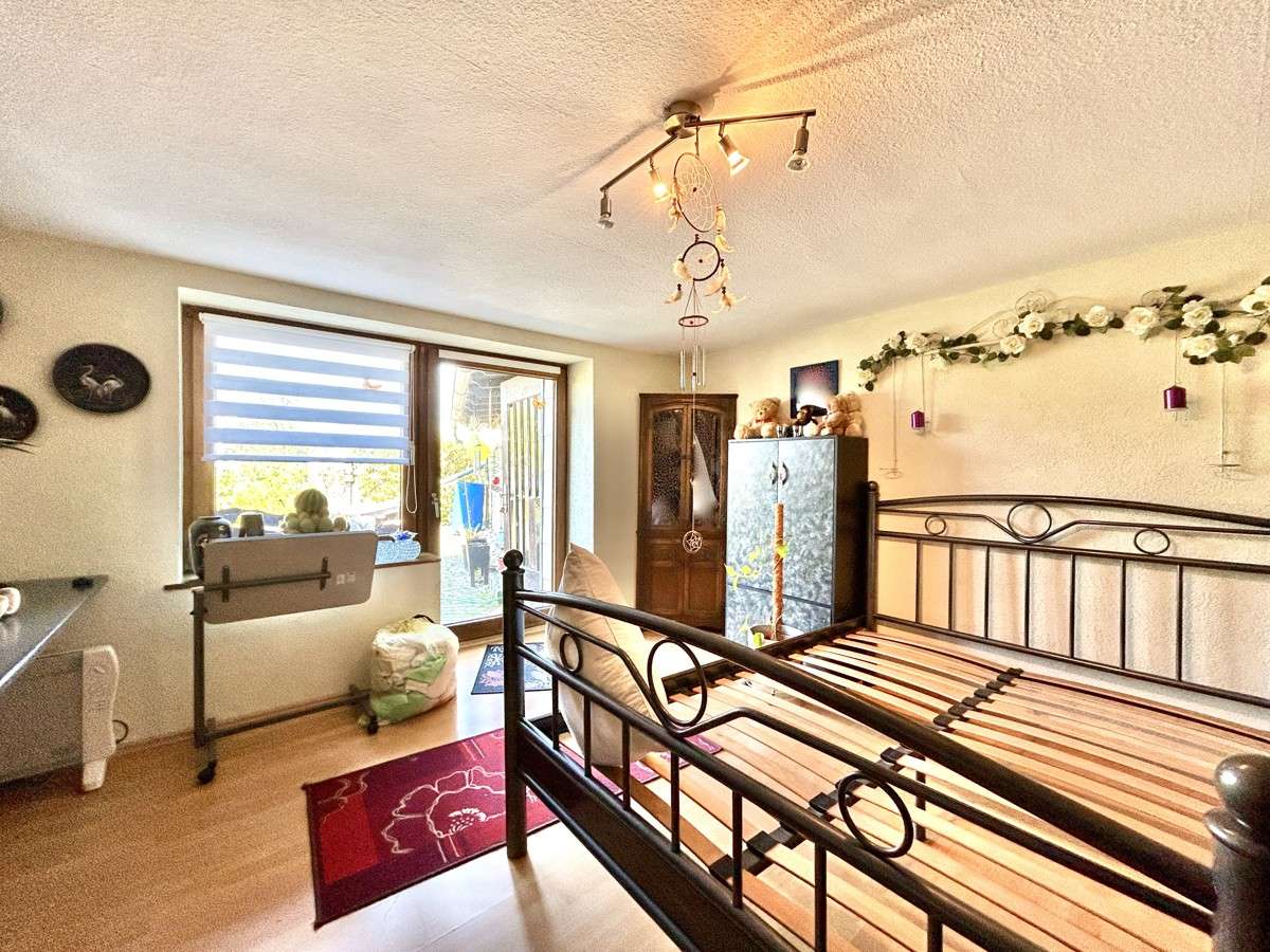 Immobilie in Dreisbach - **Gepflegte Doppelhaushälfte mit toller Gartenanlage und gräumigen Garagen in Dreisbach** - Bild 13