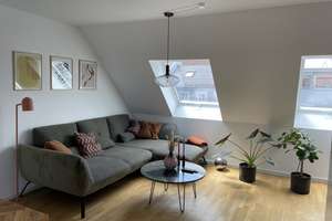 Exklusive 2,5-Zimmer-Maisonette-Wohnung mit Einbauküche & Tiefgaragenstellplatz im Zentrum ER