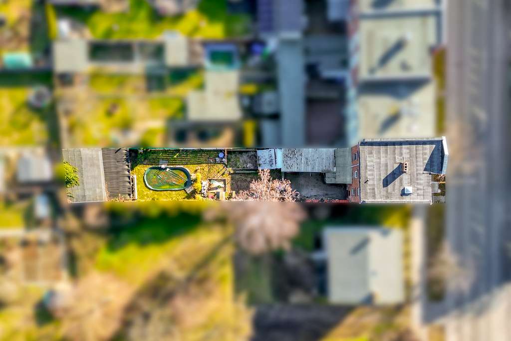 Immobilie in Schönebeck (Elbe) - Charmantes Reihenendhaus mit Gartenidylle und vielseitigem Raumkonzept auf drei Ebenen - Bild 2
