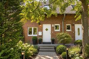 Familienfreundliches Reihenhaus mit sonnigem Garten und ganzjährigem Grünblick