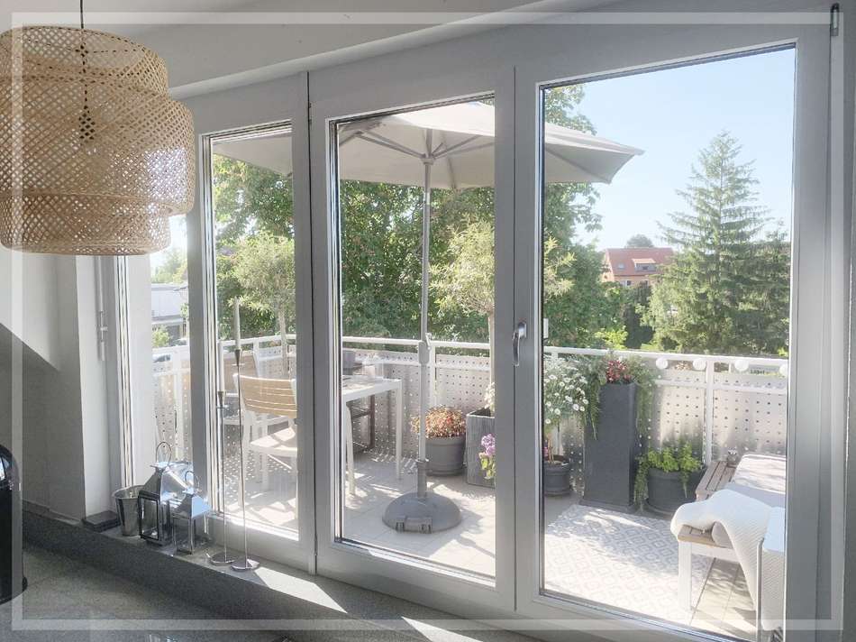 Balkon mit Blick in Dorfgärten