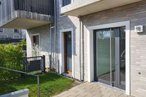 Moderne 3-Zimmer Neubauwohnung in AC-Brand mit Garten und Tiefgaragenstellplatz