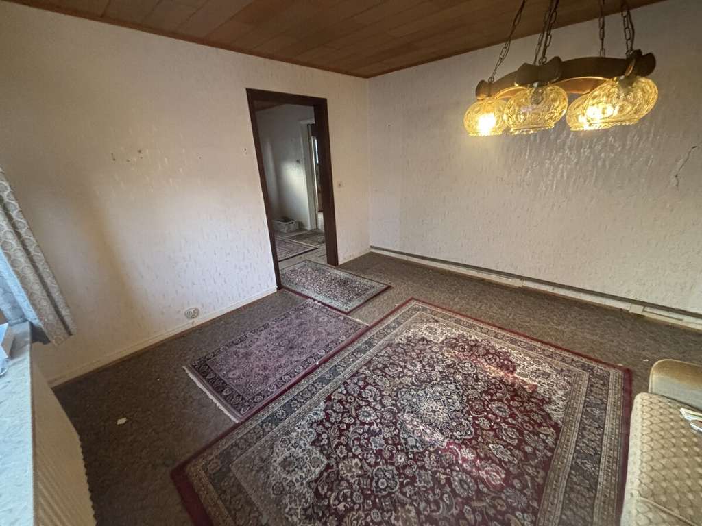 Immobilie in Neumünster - Sanierungsbedürftiges Einfamilienhaus in bester Lage in Tungendorf zu verkaufen! - Bild 1