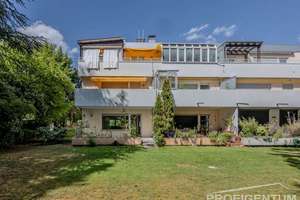 Bogenhausen: Erdgeschosswohnung mit Terrasse, Gartenzugang & großem Entwicklungspotenzial