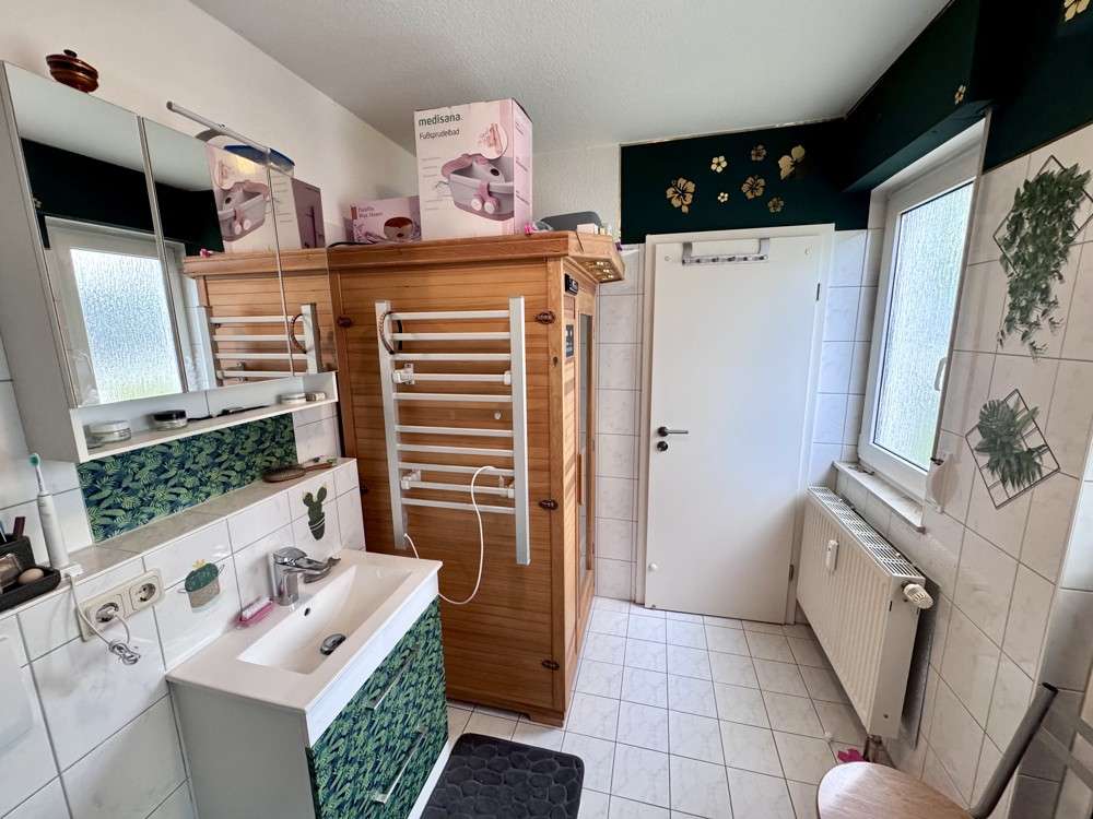 Immobilie in Sassnitz - Kaufpreis auf Anfrage - Kurze Wege zur Ostsee - Eigentumswohnung mit Garten! - Bild 1