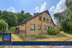 Wohnhaus mit drei Wohneinheiten und großem Entwicklungspotenzial