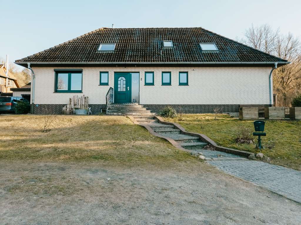 Immobilie in Bispingen - Attraktives Einfamilienhaus mit großem Grundstück, Ferienwohnung und vielen Extras  - Bild 2