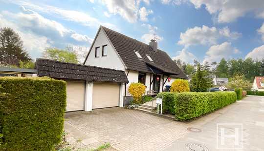 Bild von Sonniges Potential: Einfamilienhaus mit Einliegerwohnung