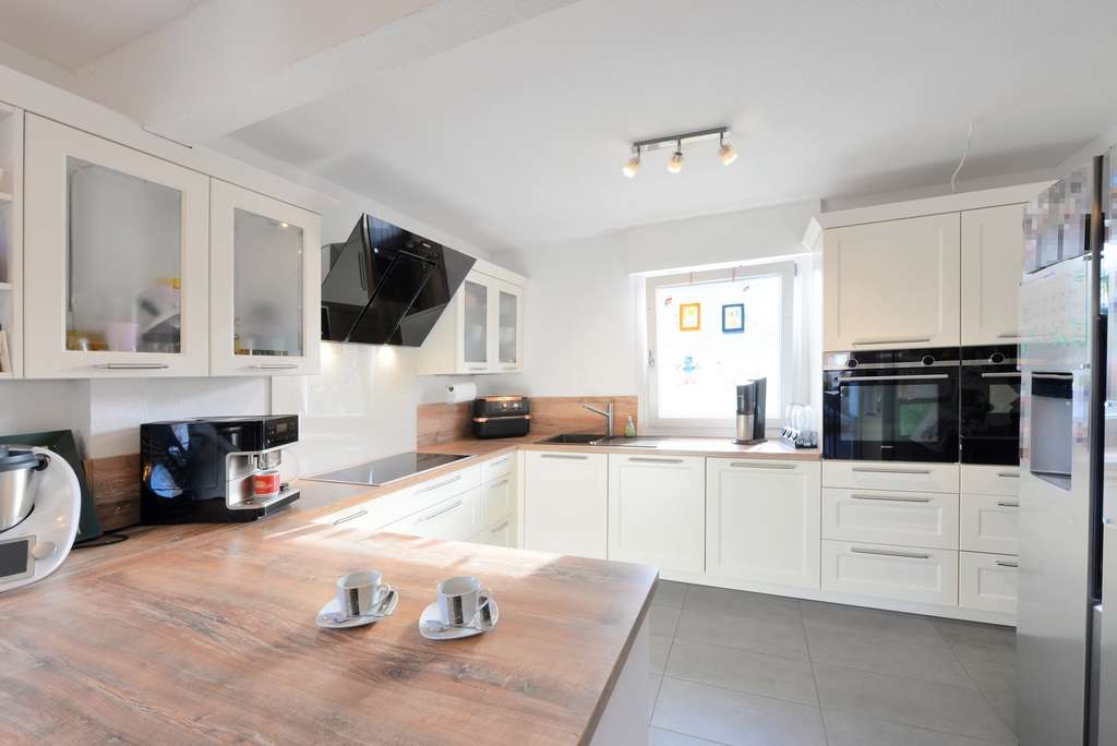 Immobilie in Sonsbeck - Freistehendes Einfamilienhaus mit Garage in Labbeck - modernisiert, in idyllischer Sackgassenlage - Bild 2