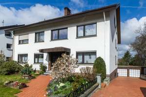 Hochwertiges Mehrfamilienhaus mit Traumgarten