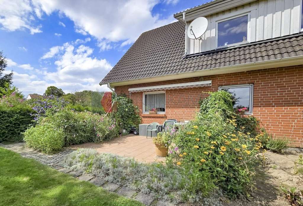 Immobilie in Steinhagen - Feldblick, Garten & Südterrasse - Wohnen auf einer Ebene - Bild 2