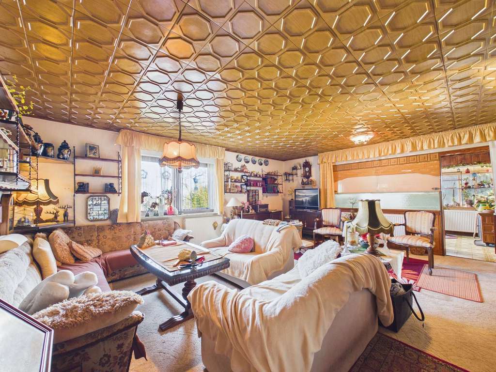 Immobilie in Florstadt - Wohnen auf einer Ebene: Bungalow mit großem Garten und viel Gestaltungspotenzial in Florstadt-Staden - Bild 1