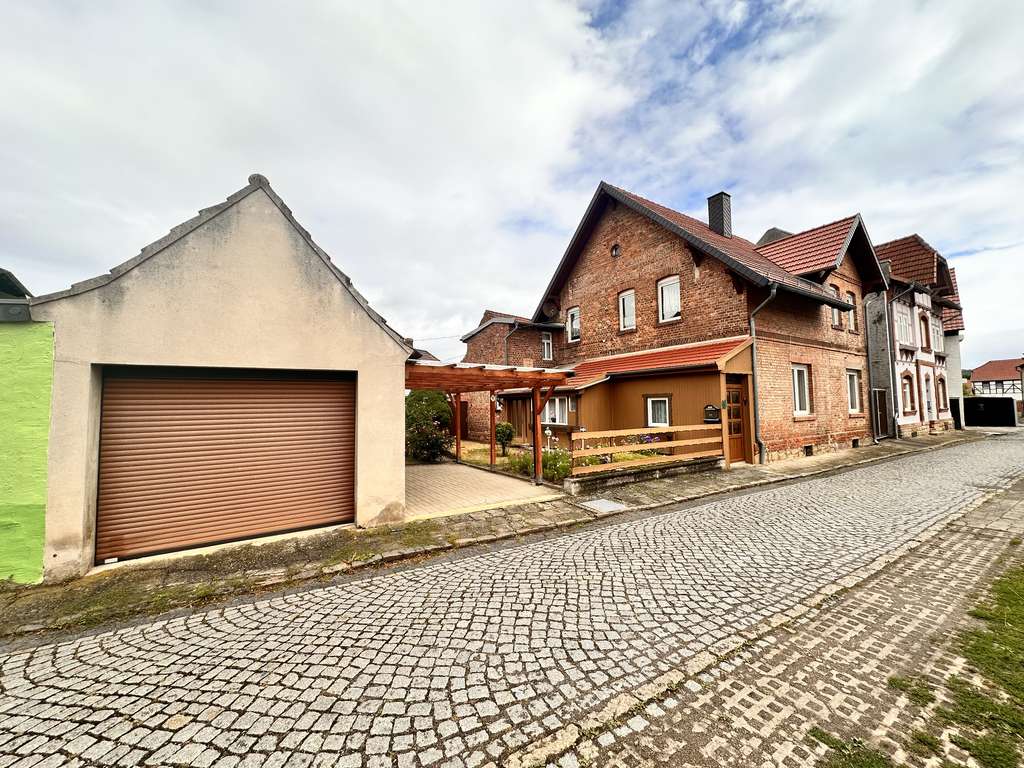 Immobilie in An der Schmücke - Gepflegtes Einfamilienhaus mit 6 Zimmern und Nebengelass für Hobby und Freizeit in Oberheldrungen - Bild 0