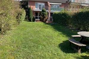 Stilvolle Maisonette-Wohnung mit Garten und Tiefgarage