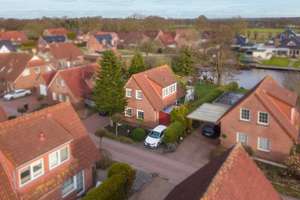 Ferienhaus am Timmeler Meer – Zwei Wohneinheiten mit privater Steganlage – Die vollständige Adresse der Immobilie erhältst du vom Anbieter., 26629 Großefehn – Vorschaubild 1
