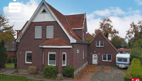 Bild von Stilvolles 20er-Jahre-Haus mit modernem Anbau