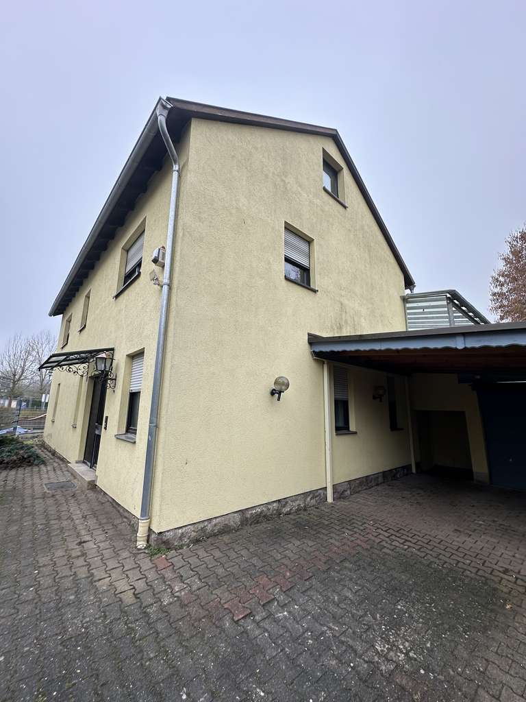 Immobilie in Münnerstadt - Großzügiges Zweifamilienhaus in ruhiger Wohnlage von Münnerstadt - Bild 1