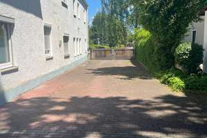 Mehrfamilienhaus mit Gewerbefläche und Entwicklungspotenzial in München