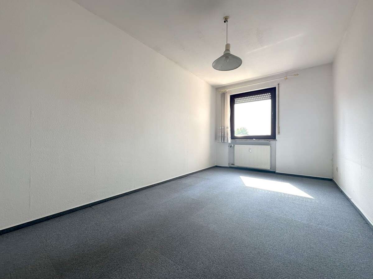 Immobilie in Wörth am Rhein - Helle 3-Zimmer Eigentumswohnung mit Balkon und Stellplatz in attraktiver Lage von Maximiliansau - Bild 8