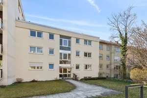 3-Zimmer-Wohnung mit Garten, Hobbyräumen und zwei Tiefgaragenstellplätzen in München-Gern