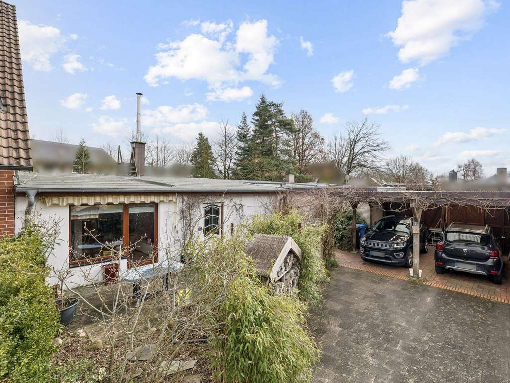 Immobilie in Gönnebek - Wohnen auf einer Ebene – großzügiges Zweifamilienhaus in Trappenkamp - Bild 0