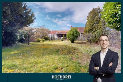 Sonniges Baugrundstück mit Dreifamilienhaus und charmanter Werkstatt zum Kauf in Nieder-Ingelheim