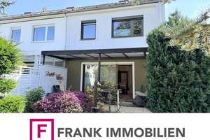 FRANK IMMOBILIEN Liebenswertes Reihenendhaus mit weitläufigem Gartenglück  sucht kreative Hände!
