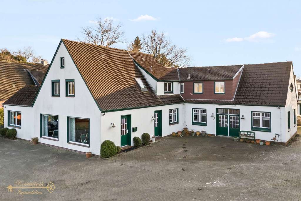 Immobilie in Jade - Wohn- und Geschäftshaus mit vielseitiger Gewerbefläche - Bild 1