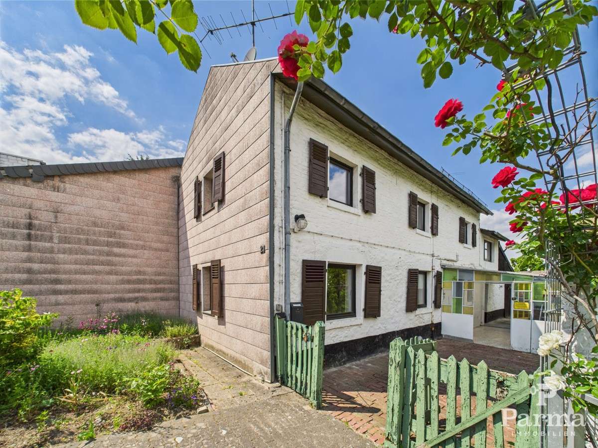 Einfamilienhaus mit Entwicklungspotential in ruhiger Lage von Langerwehe-Schlich, Düren Kreis – Bild 1