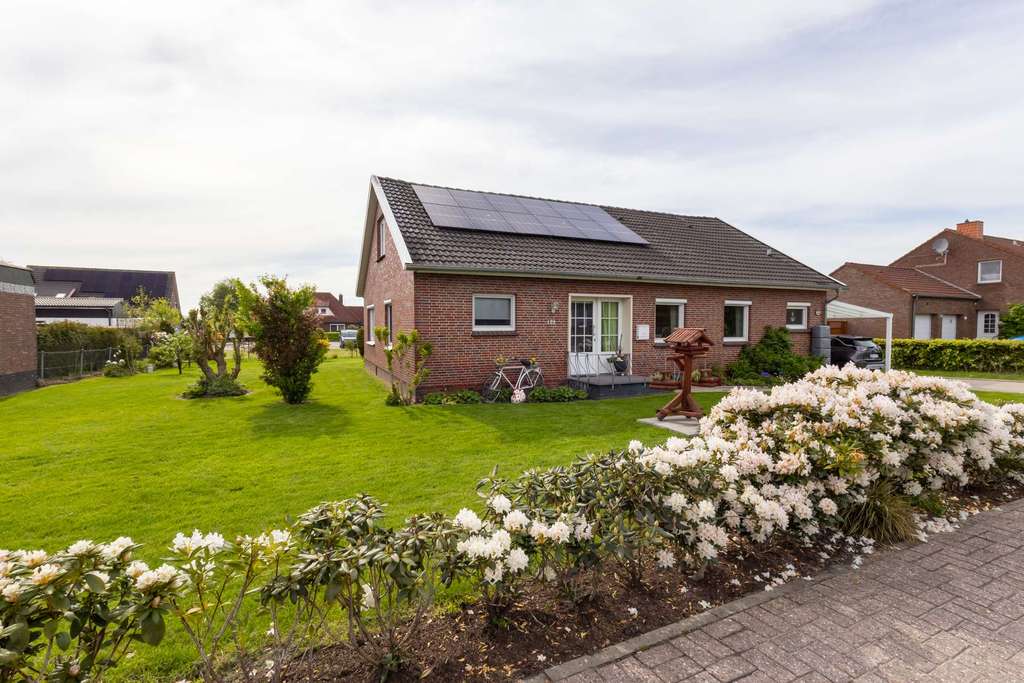 Immobilie in Osteel - Gepflegtes Einfamilienhaus mit Garage, PV-Anlage und Wärmepumpe - Bild 1