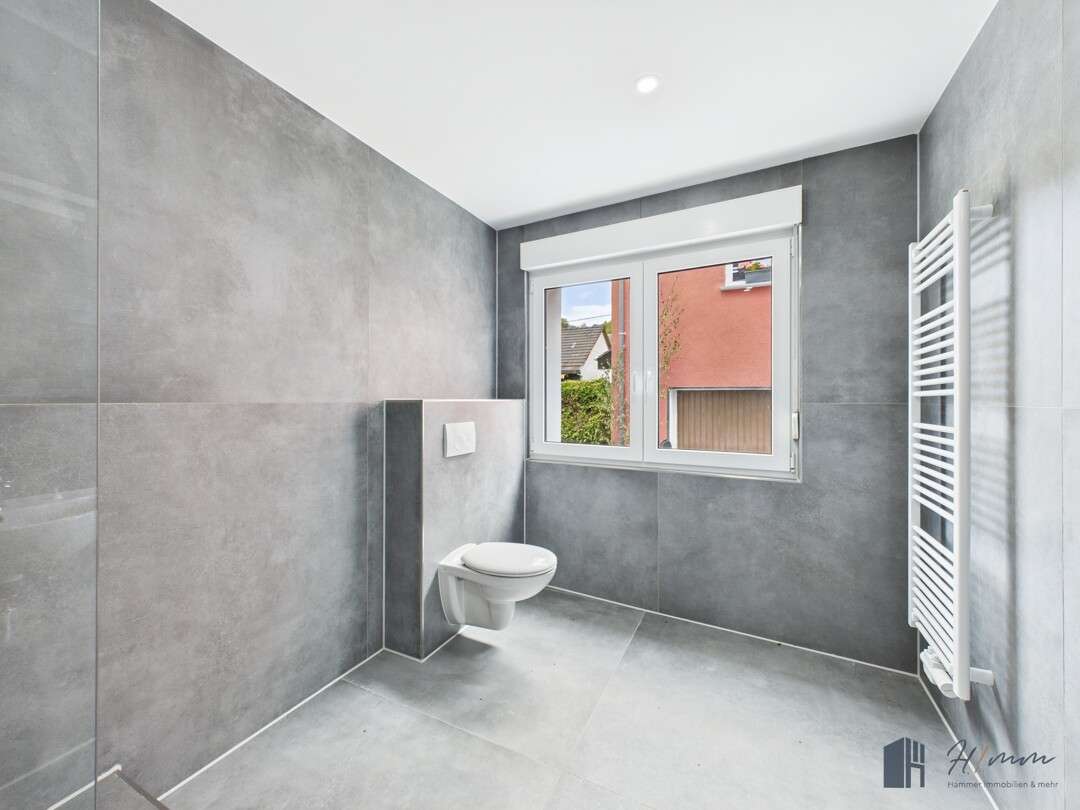 Immobilie in Rheinbrohl - Modernisiertes Reihenhaus in Rheinbrohl – Wohnen mit Rheinblick und Familienkomfort! - Bild 9