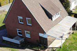 Viel Platz für die große Familie! 160 m² Wfl. 1907 m² Grundstück, 4 Garagen in ruhiger Lage! – Märchenweg 2, 31618 Liebenau – Vorschaubild 3