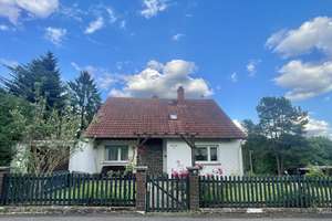Wunderbares Einfamilienhaus mit tollem Grundstück in bester Wohnlage von Nieder-Moos!